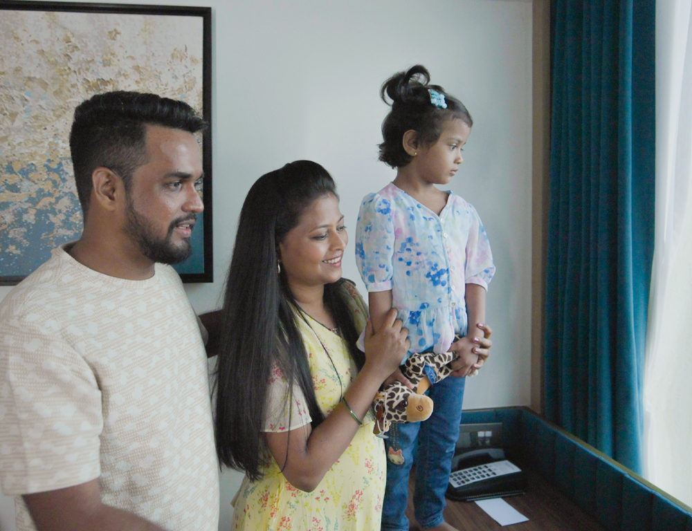 Nilesh and family near window