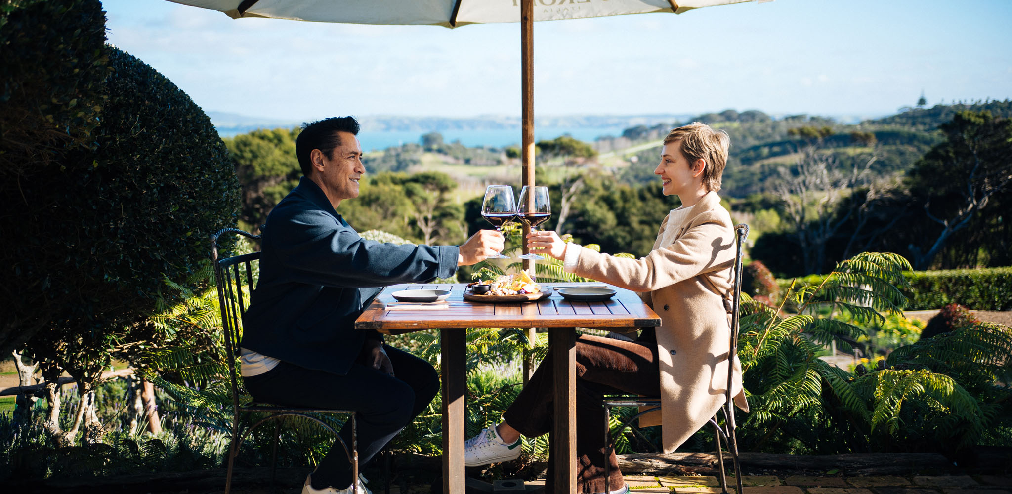 Couple enjoying a romantic vineyard lunch with Accor Plus dining privileges