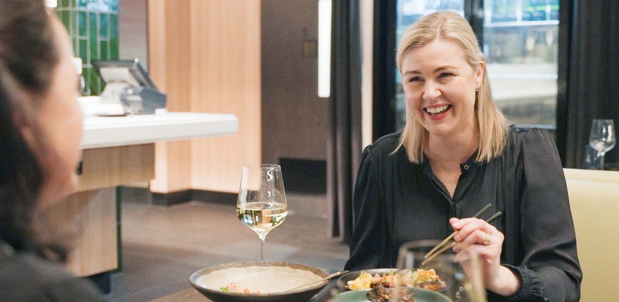 Rennae enjoying a dining experience at Movenpick Hotel Melbourne with Accor Plus membership benefits.