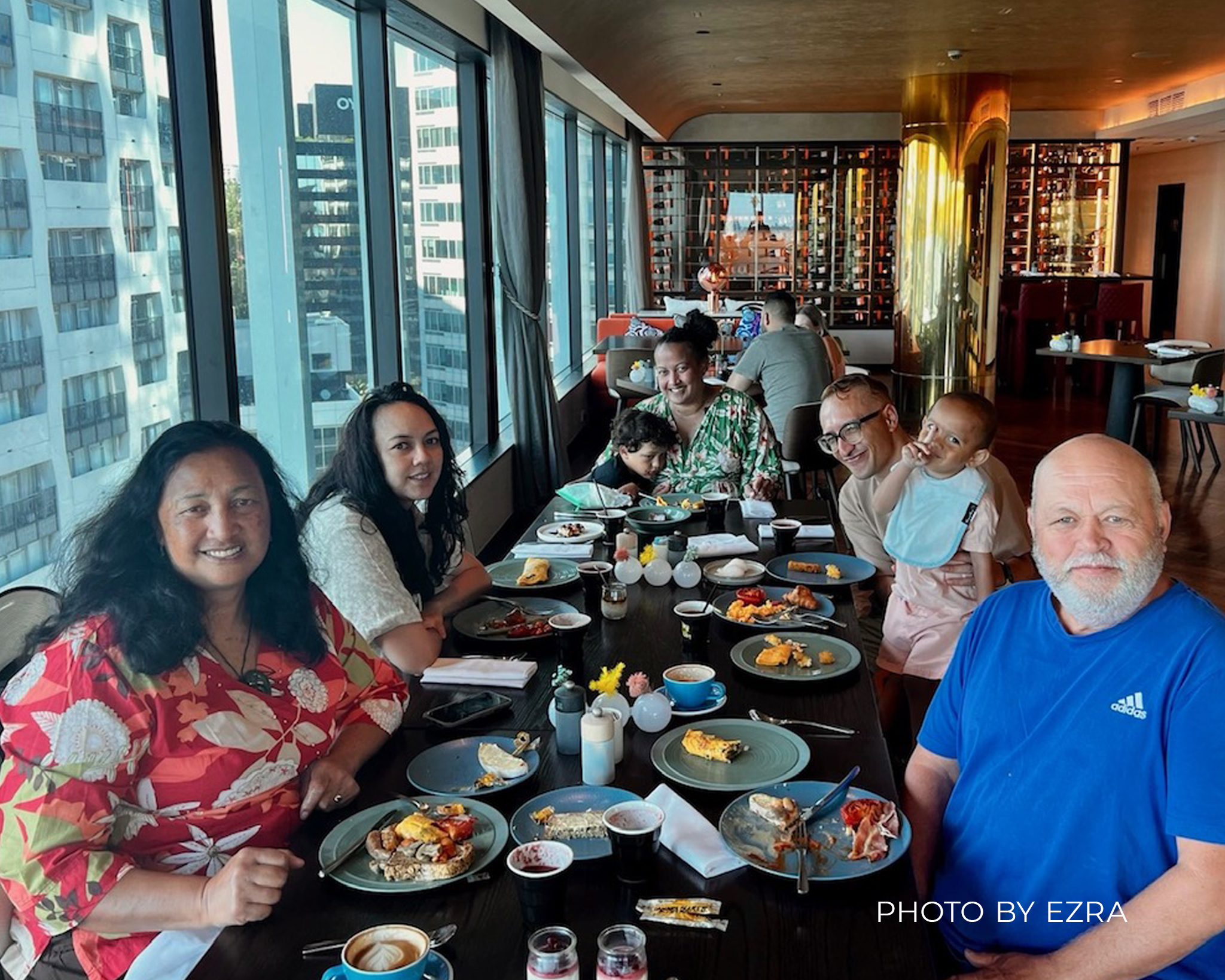 Henry's family enjoying a discounted meal and hotel stay with Accor Plus membership at Sofitel Auckland Viaduct Harbour.