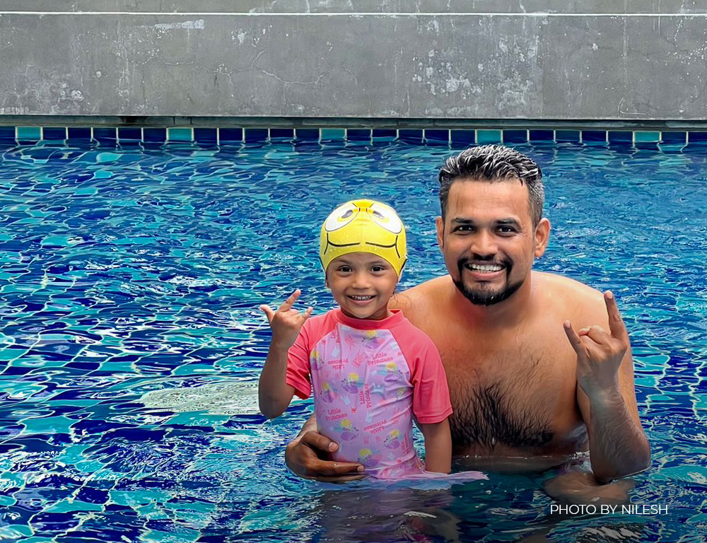 Nilesh enjoying a special moment with his child during an Accor Plus vacation