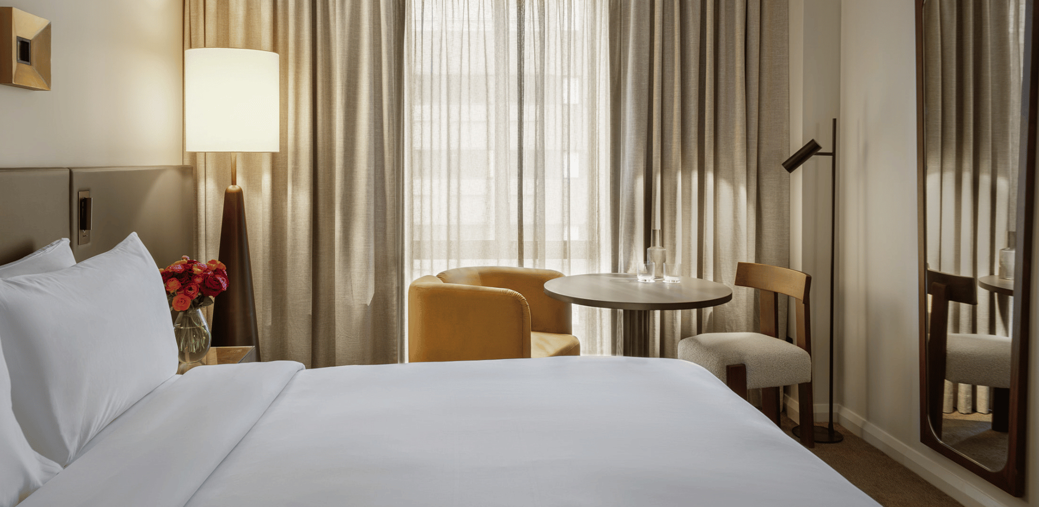 Luxury guest room at Sofitel Sydney Wentworth with modern French-inspired design and elegant furnishings